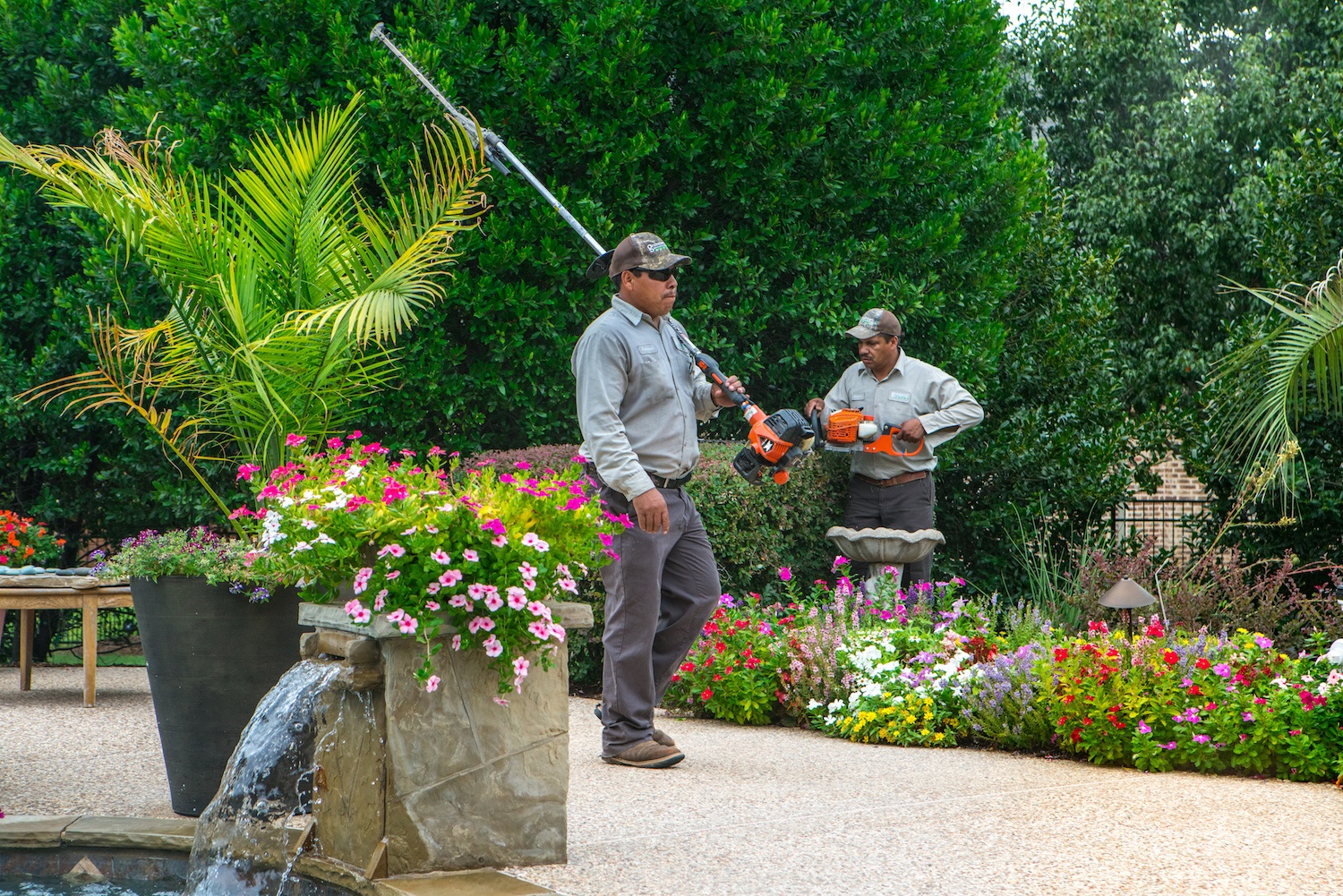 grassperson-crew-maintenance-flowers-bushes-shrubs