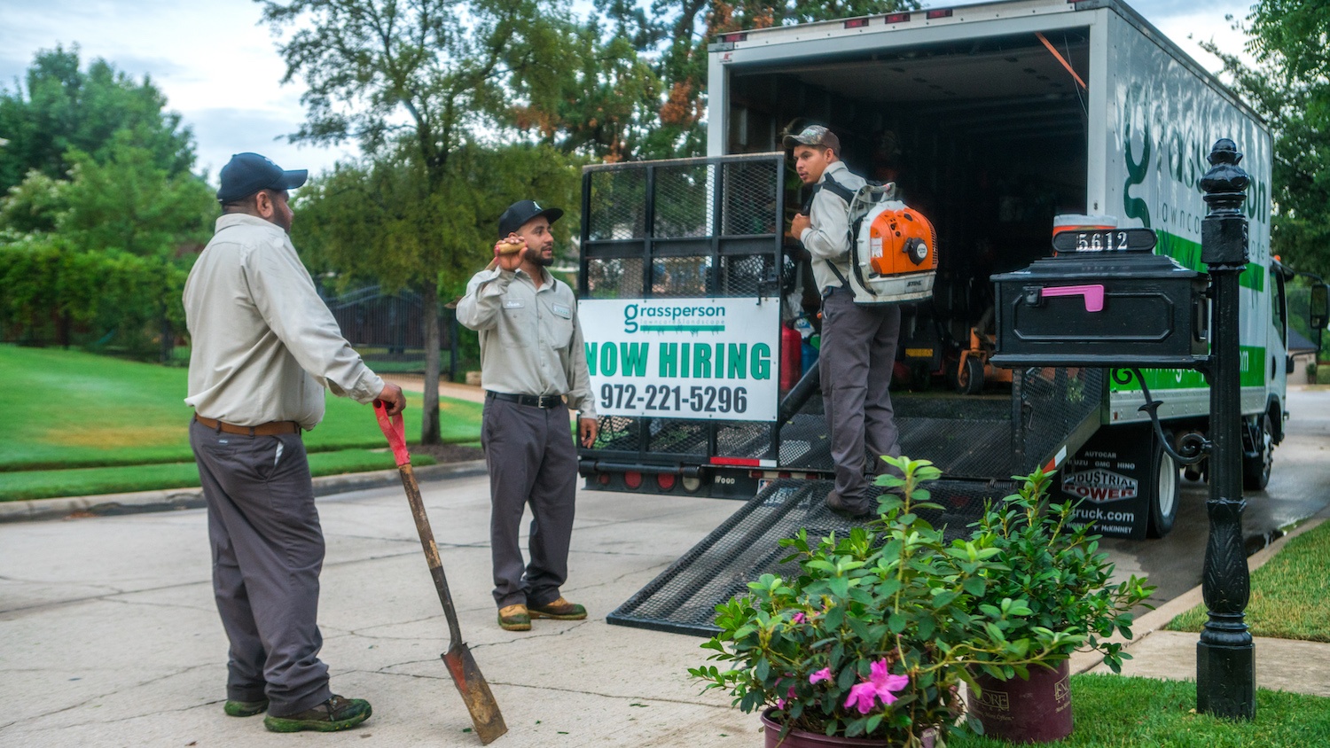 grassperson-crew-truck-planting-hiring sign
